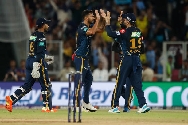 AHMEDABAD, INDIA - MAY 29: Mohit Sharma of the Gujarat Titans celebrates the wicket of Ajinkya Rahane of the Chennai Super Kings during the 2023 IPL Final match between Chennai Super Kings and Gujarat Titans at Narendra Modi Stadium