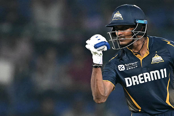 Gujarat Titans' Sai Sudharsan celebrates after scoring a century (100 runs) during the Indian Premier League (IPL) Twenty20 cricket match between Delhi Capitals and Gujarat Titans at the Arun Jaitley Stadium in New DelhI