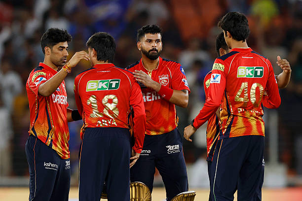 AHMEDABAD, INDIA - JUNE 01: Shreyas Iyer of Punjab Kings congratulates teammates following the team's victory in the 2025 IPL Qualifier 2 match between Punjab Kings and Mumbai Indians